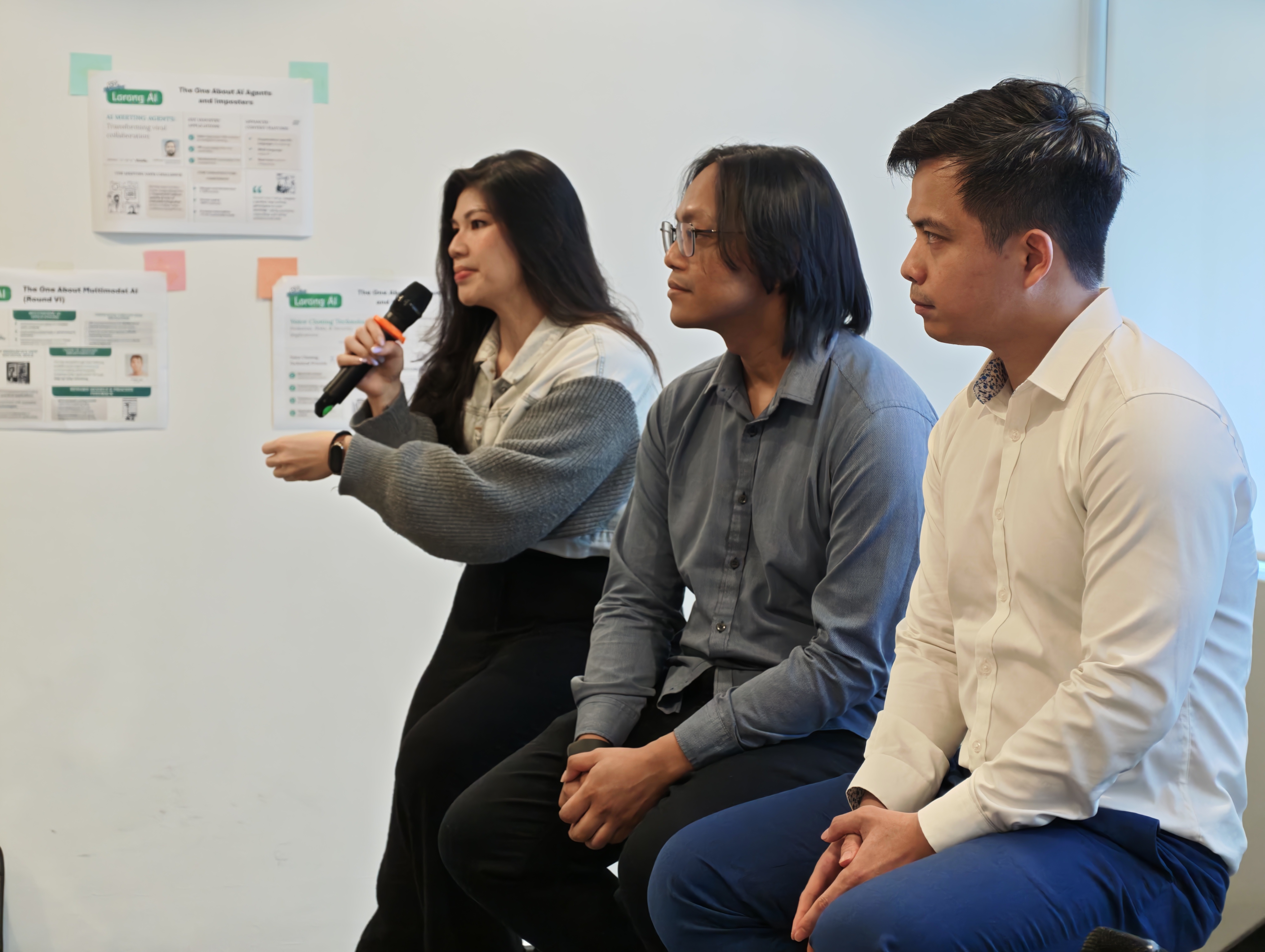 Mabel speaking on a panel at Lorong AI